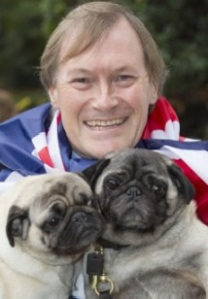 Sir David Amess with two dogs
